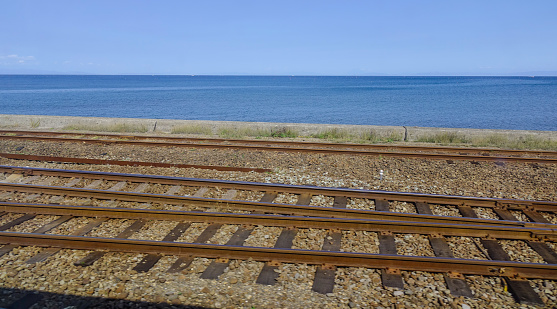 Railroad tracks beside the Japan Sea in Hokkaido, Japan.