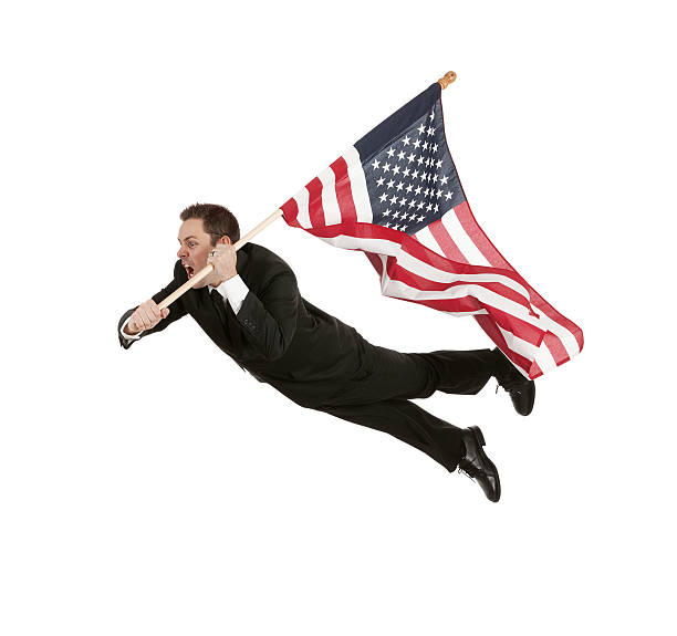 istock Businessman flying with an American flag 174828622