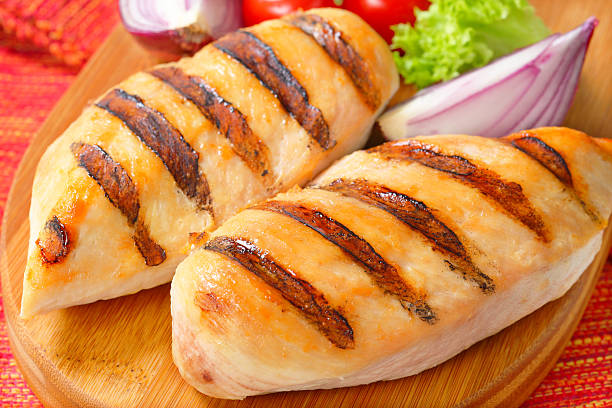 grilled chicken breasts stock photo