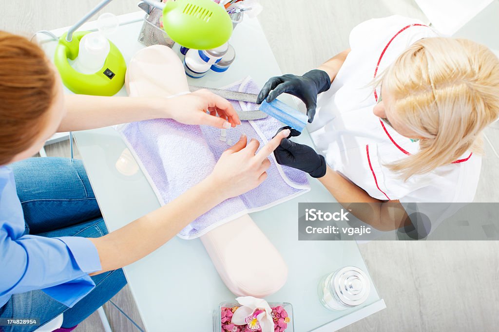 Manicure. - Foto stock royalty-free di Ambientazione interna