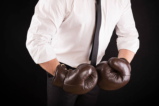 istock businessman with boxing gloves 174828980