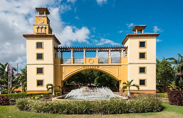 "The entrance to the Municipality of Hialeah. The design came out of a Charrete promoting the City of Hialeah a.k.a athe City of Progressai. The entrance is out of proportion, scale and its details are caricaturesque. It isnaat even an entrance. Yet it represents the desire of Hiealeah residents, politicians and planners to claim the inauthentic in order to craft a vision of progress."