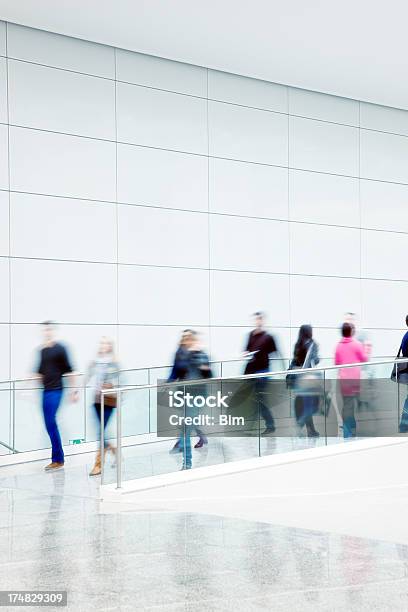 Motion Blurred People Walking Indoors Stock Photo - Download Image Now - Railing, Station, Abstract