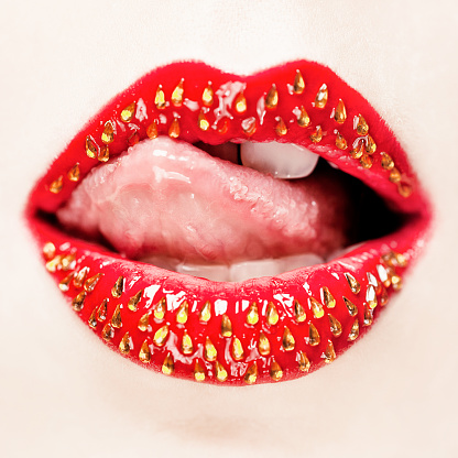 Lips with strawberry make-up.