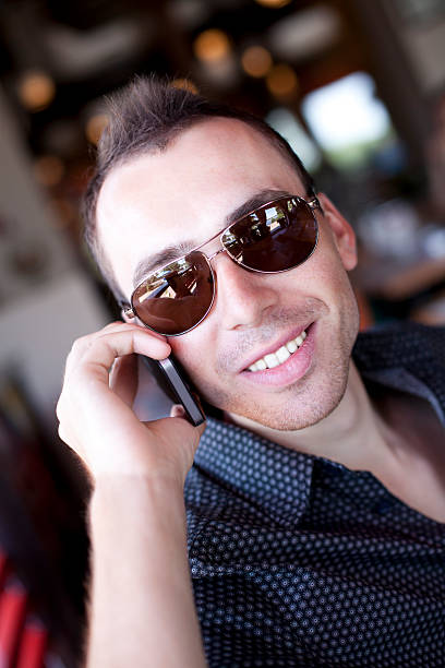 istock Young Happy Man On The Phone 174829712
