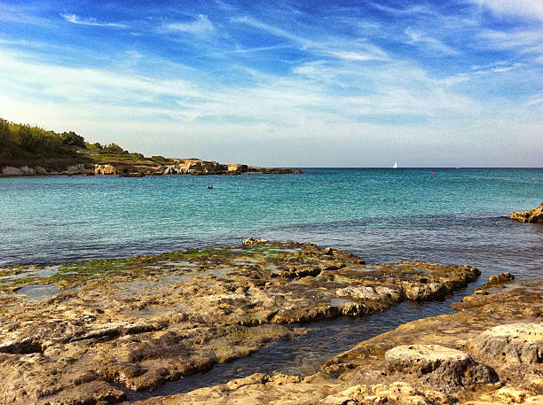 istock Italian beach rocky landscape 174830075