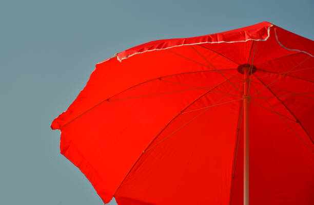 istock Red umbrella at outdoor coffee shop 1748301005
