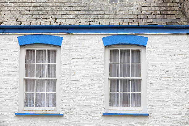 istock facade of a typical British cottage in Cornwall 174830351