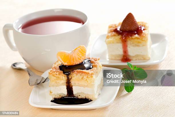 Cheesecakes With Tangerine And Strawberry Stock Photo - Download Image Now - Slice of Cake, Sweet Pie, Tea - Hot Drink