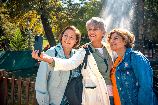 Senior women tourist group taking selfie