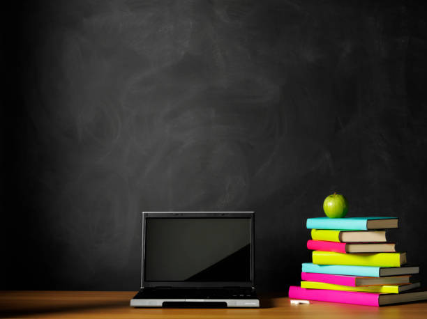 istock Laptop Computer and Books on the Teacher's School Desk 174830684