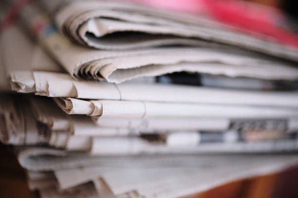 istock Image of newspapers tied together 1748310725