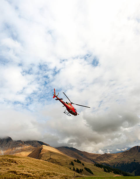 istock red rescue helicopter flying in valley 174831169