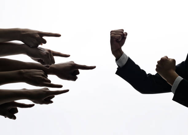 istock Hands pointing to the strong arm of man. 174831357