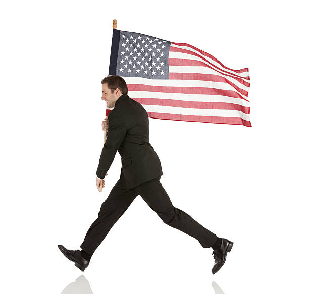istock Businessman carrying an American flag 174831671