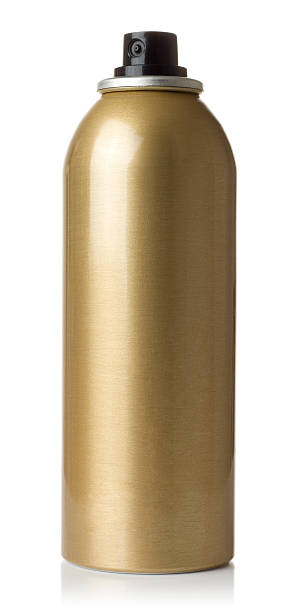 золотистая металлизированная аэрозольный баллон - hairspray стоковые фото и изображения