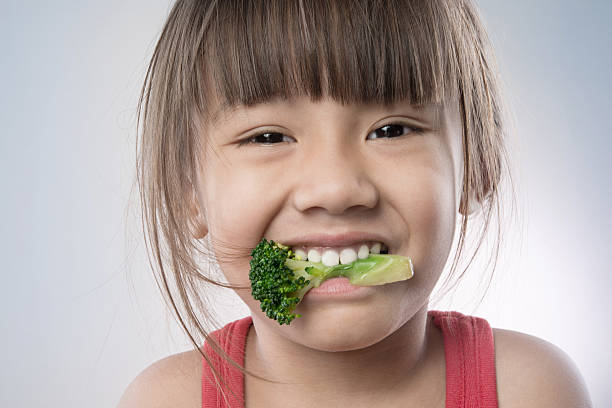 istock Little girl with vegetable 174832204