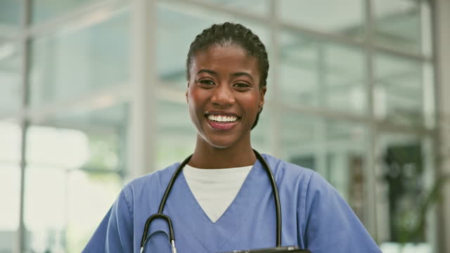 Face, doctor and black woman with a tablet, healthcare and connection with internet, smile and research. Portrait, nurse and medical professional in a hospital, technology and employee with uniform