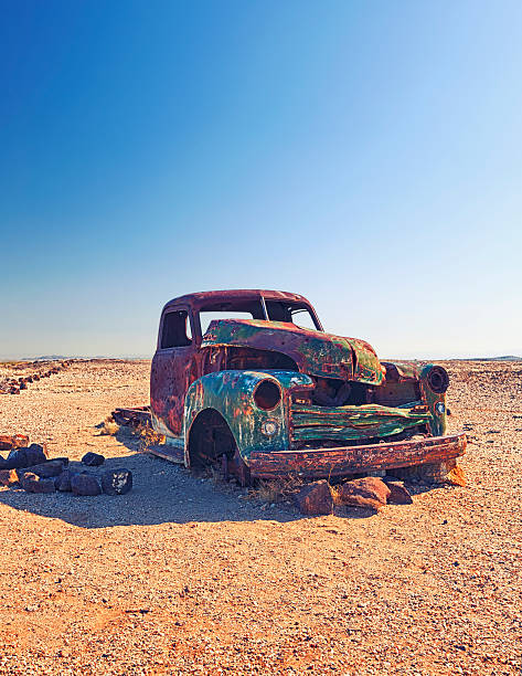 istock Old pick up truck left in desert 174832502