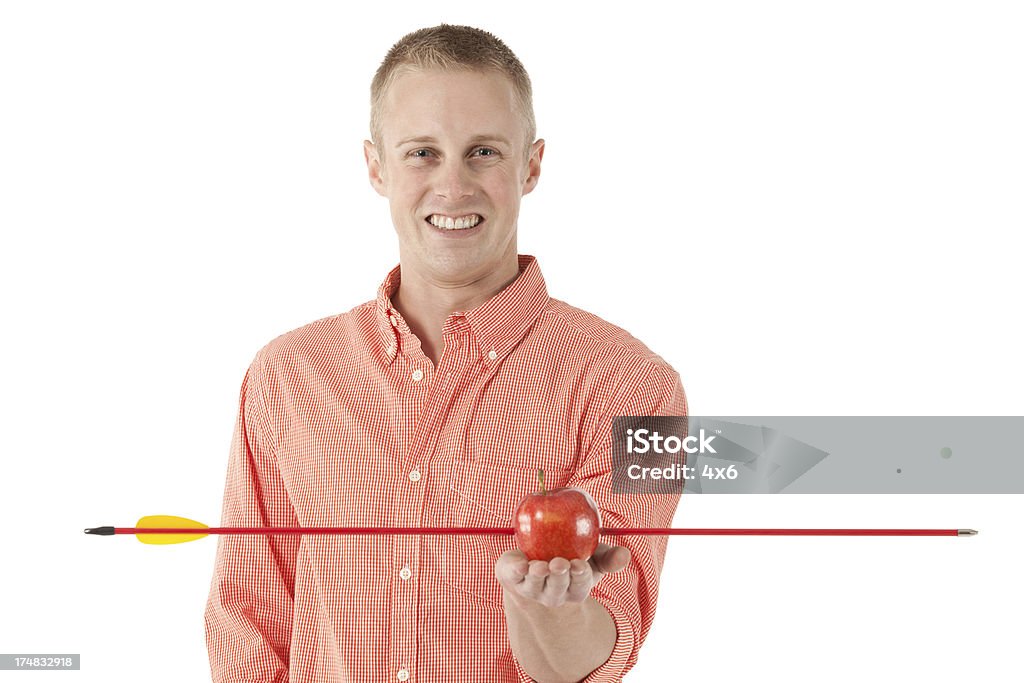 Homem com uma seta na apple - Royalty-free Fotografia da Cabeça Foto de stock