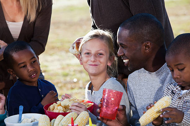 istock Family and friends at picnic 174833100