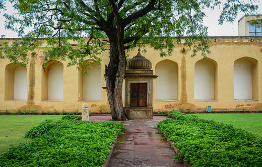 Ancient palace with garden at summer day in Jaipur, India.