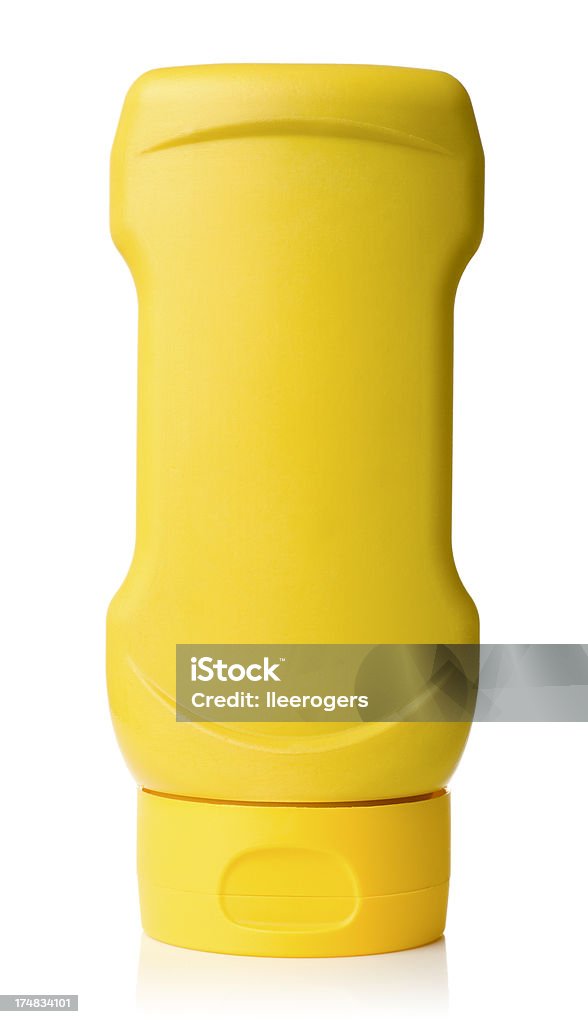 Mostaza americana botella aislado sobre un fondo blanco - Foto de stock de Mostaza americana libre de derechos