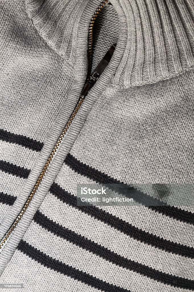 zip vest Close-up product shot  of gray zip vest with black stripes on it. Sports Clothing Stock Photo