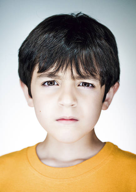 istock kid portrait intense stare 174835094