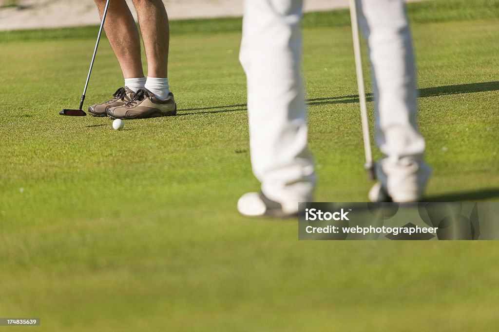 Gra w golfa - Zbiór zdjęć royalty-free (30-39 lat)