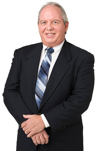 Smiling Mature Man In Suit and Tie stock photo