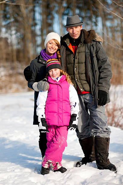istock Family outside in the snow 174836402
