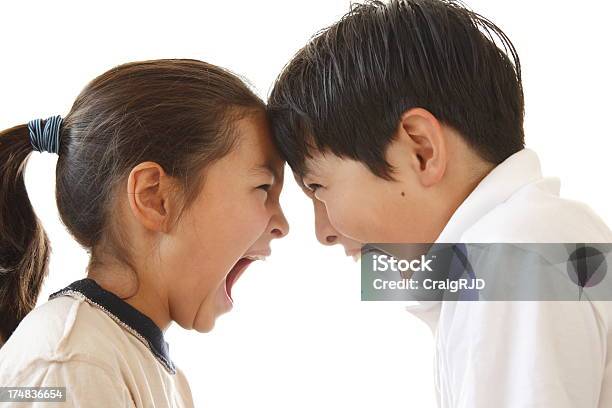 Childrens Arguement - Fotografie stock e altre immagini di Close-up - Close-up, Famiglia, Fare le boccacce