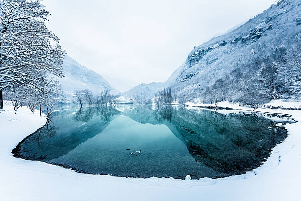 Scenic view of Lago di Braies lake in winter, Dolomites, Italy