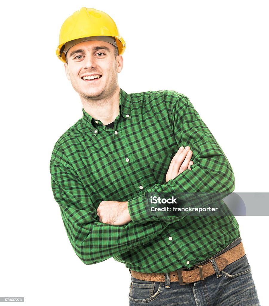 Operaio manuale con casco Appoggiarsi - Foto stock royalty-free di Addetto alla manutenzione