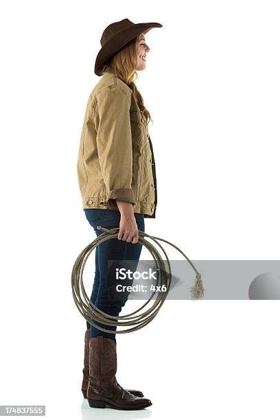 Profil Von Ein Cowgirl Mit Lasso Stockfoto und mehr Bilder von Bühnenkostüm - Bühnenkostüm, Cowboyhut, Cowboystiefel