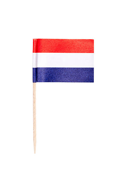 Dutch paper flag Dutch paper toothpick flag. Nice paper texture. Isolated on white. cocktail stick stock pictures, royalty-free photos & images