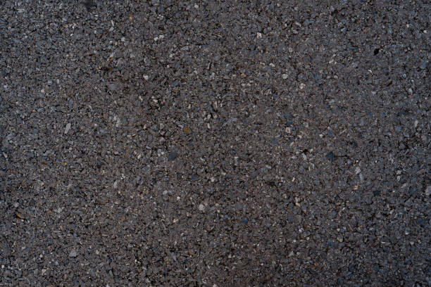 istock background texture of rough asphalt 1748382554