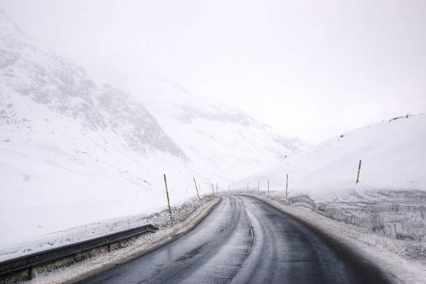 istock Wintry Mountain Road High in the Swiss Alps 174838267