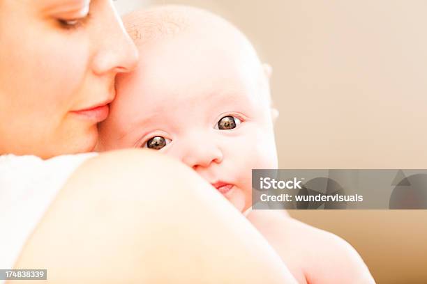 Mother Holding Baby Stock Photo - Download Image Now - Baby - Human Age, Shoulder, 0-11 Months