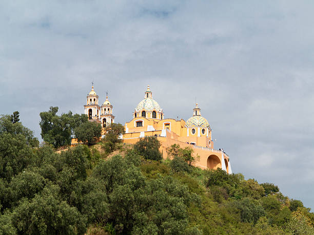 istock Curch on top of aztec pyramid in Cholula, Mexico 174838460