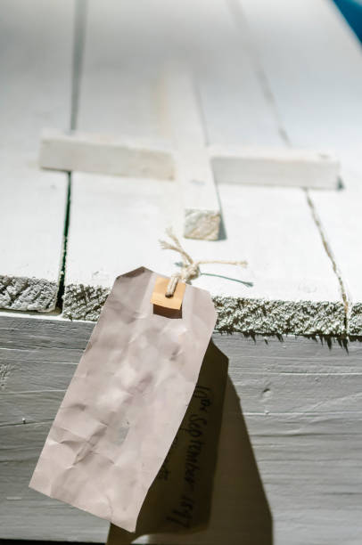 istock White, homemade child's coffin, with a blank label 1748390319