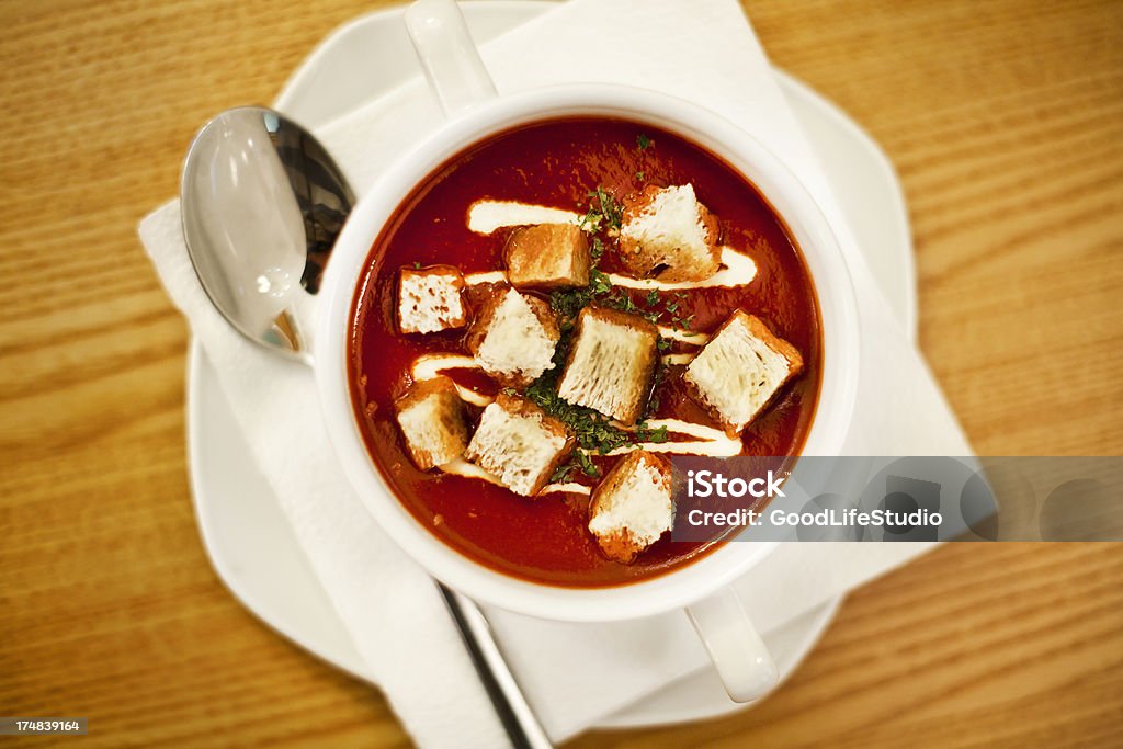 Tomato soup with croutons Plate of hot tomato soup with pieces of bread and double cream Bread Stock Photo