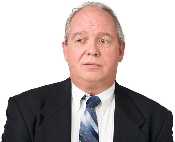 istock Uncertain Man In Shirt And Tie Looks Away 174839166