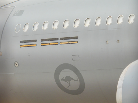 The forward fuselage of a Royal Australian Air Force Airbus KC-30A, the military version of an A330-200, registration A39-007, parked at Sydney Kingsford-Smith Airport. The plane is named 