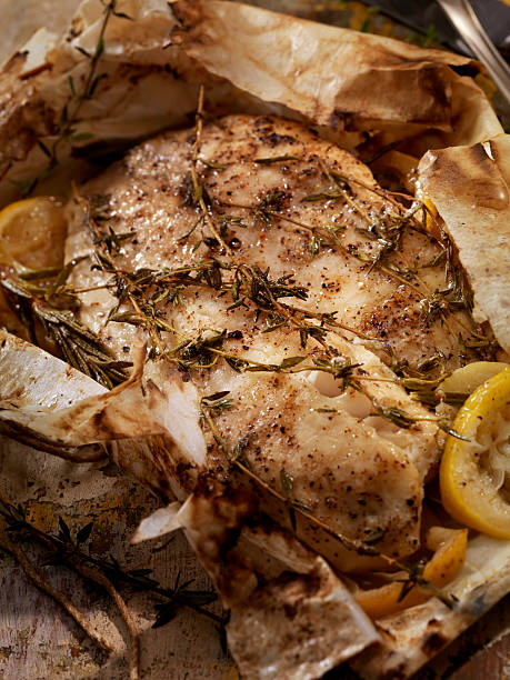 istock Lemon Herb Fish in Parchment Paper 174839533