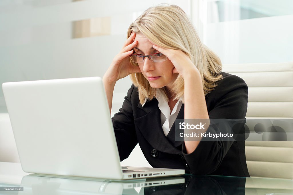 Business woman in problems frustrated Photo of the frustrated businesswoman unable to cope with problems on work. Horizontal framing, adobeRGB photo. 30-39 Years Stock Photo