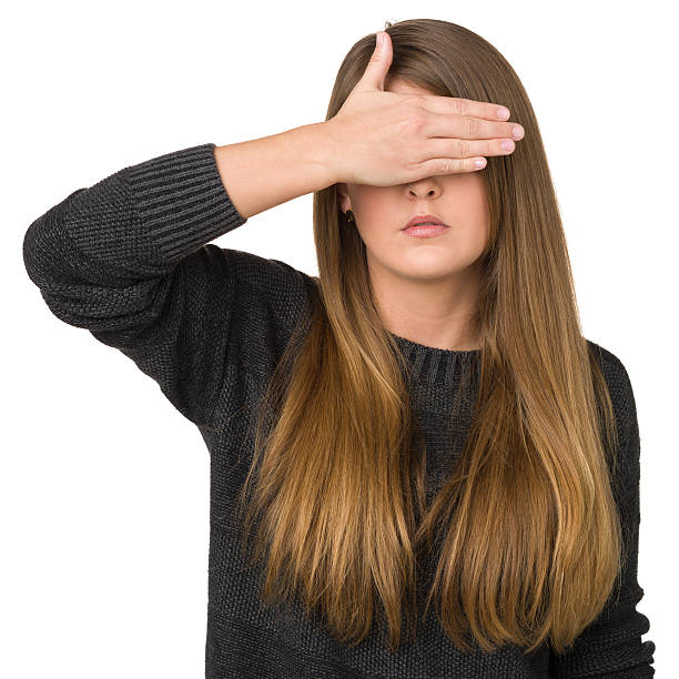istock Young Woman Covering Her Eyes 174840549