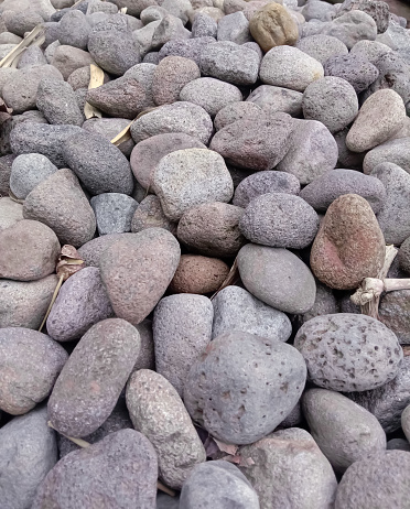 Gravel is a loose aggregation of rock fragments. Gravel occurs naturally on Earth as a result of sedimentary and erosive geological processes; it is also produced in large quantities commercially as crushed stone.