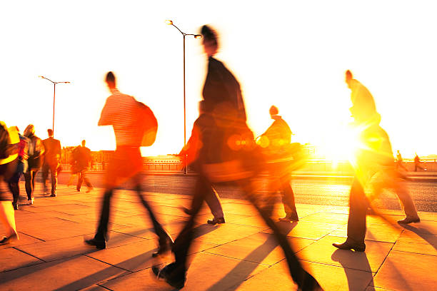 istock Blurred Business People Rushing in Sunset Light, London, England 174840603